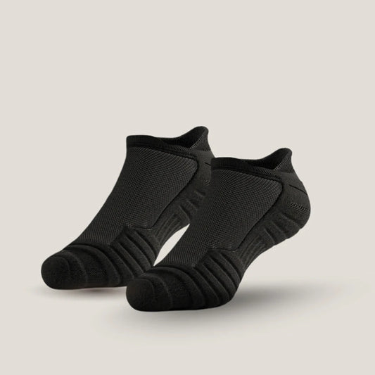 Pair of black SlabProof Low Cut work socks with cushioned ribbed soles and heel tabs